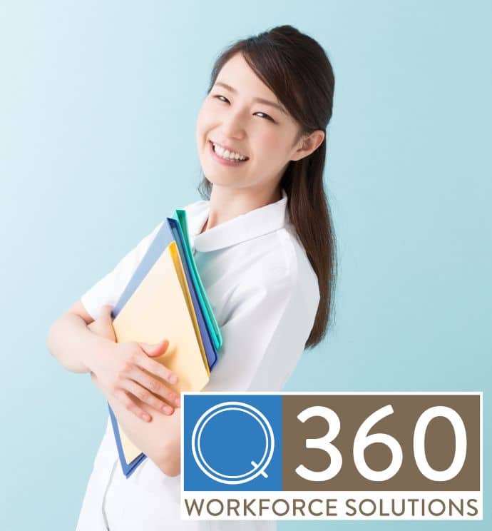 Female Asian school nurse smiling while holding files