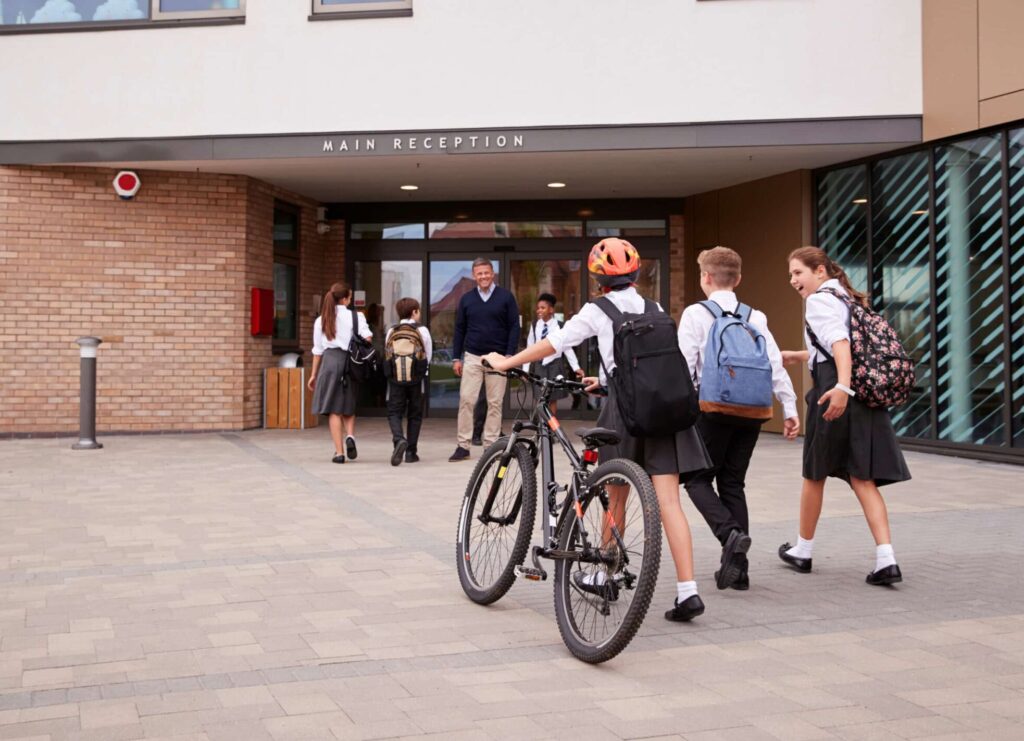 Group of students walking into school