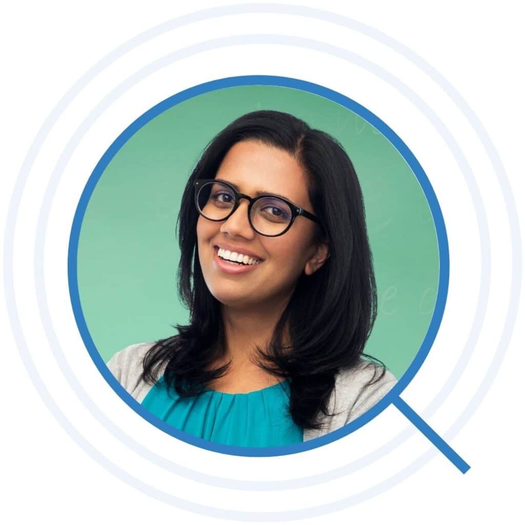 Happy smiling young indian woman in glasses