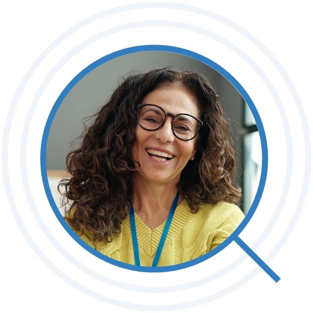 Early childhood teacher laughing